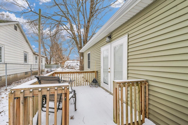 view of snow covered deck