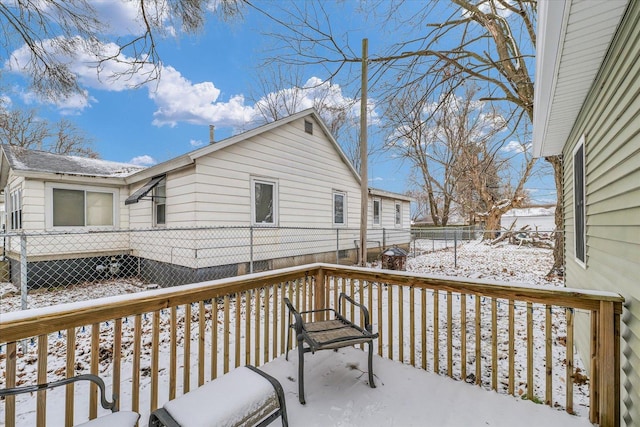 view of snow covered deck