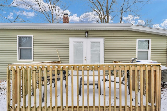 view of snow covered deck