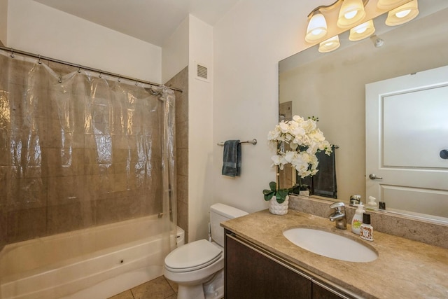 full bathroom featuring tile patterned flooring, vanity, toilet, and shower / tub combo