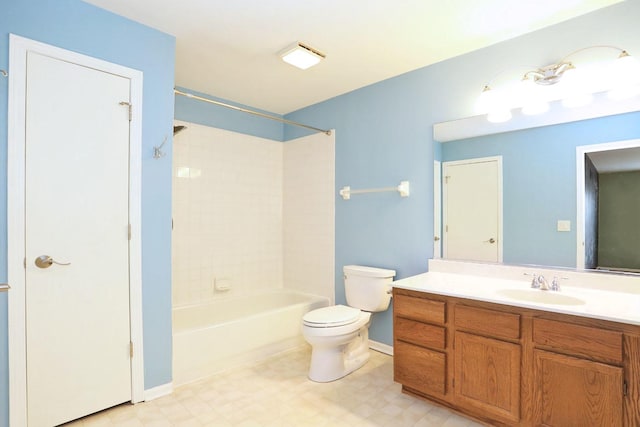 full bathroom with vanity, toilet, and tiled shower / bath