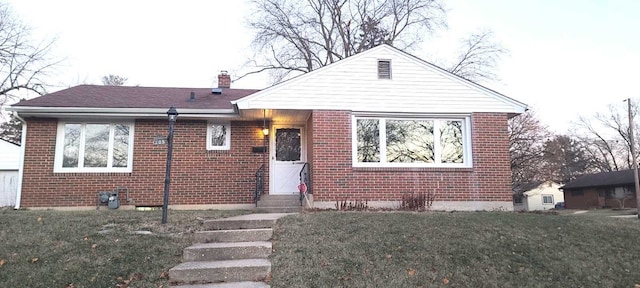 bungalow with a front lawn