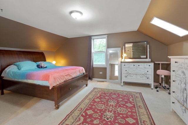 bedroom with light carpet and vaulted ceiling