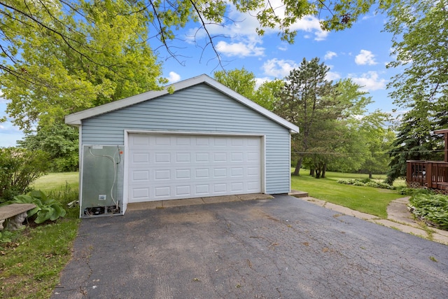 garage with a lawn