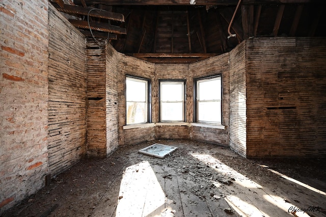 miscellaneous room with brick wall