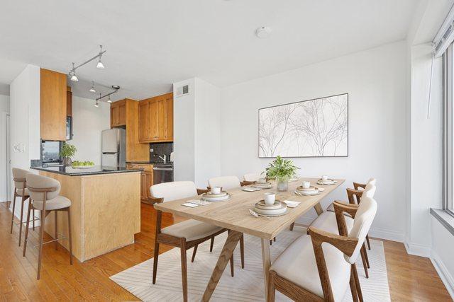 dining space featuring light hardwood / wood-style floors