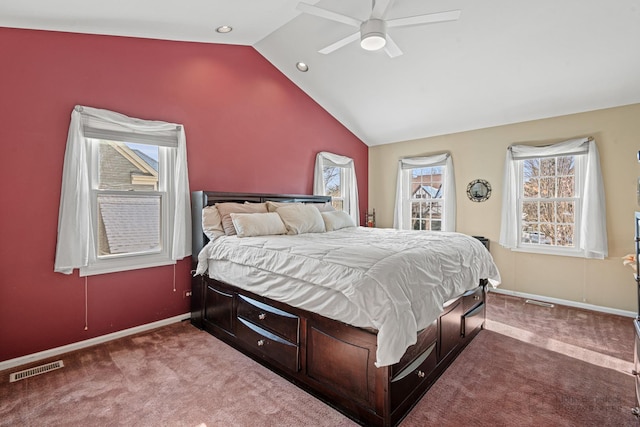 bedroom featuring ceiling fan, carpet floors, and lofted ceiling