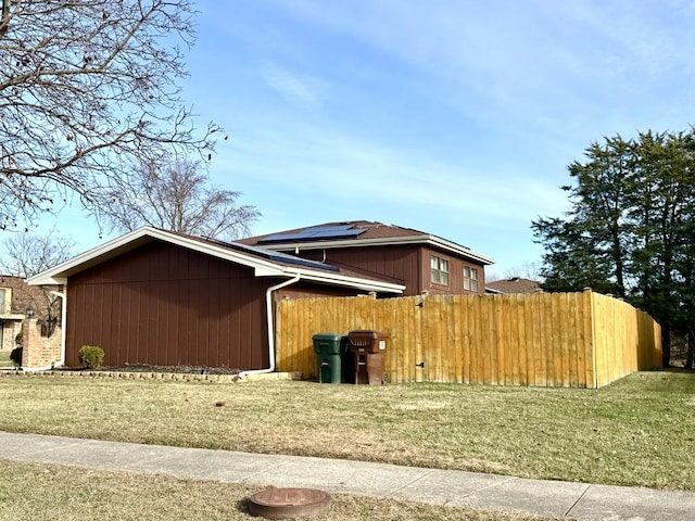 view of home's exterior featuring a lawn