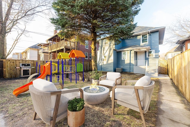 view of jungle gym with central AC unit