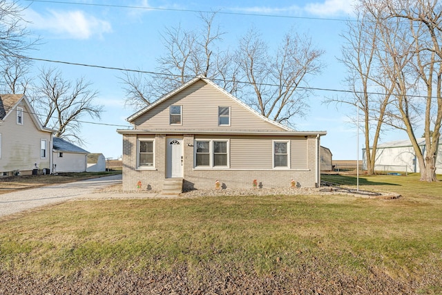 bungalow with a front lawn