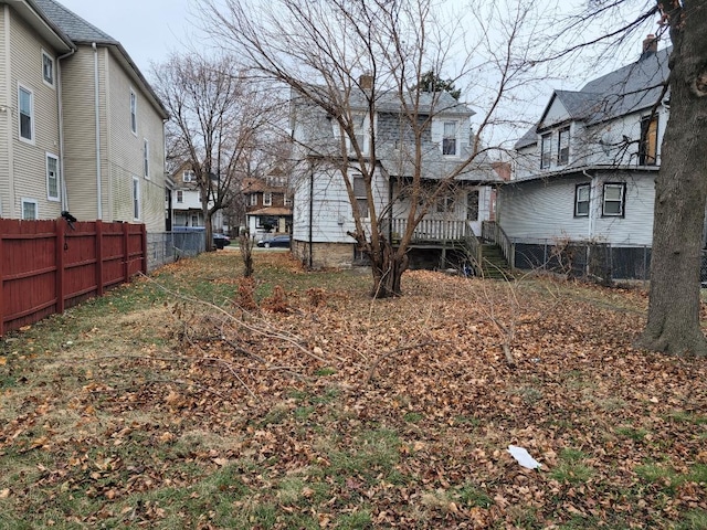 view of yard featuring a wooden deck