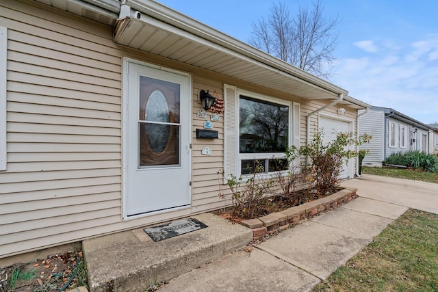 entrance to property featuring a garage