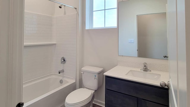 full bathroom featuring vanity, bathtub / shower combination, and toilet