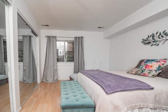 bedroom featuring hardwood / wood-style flooring