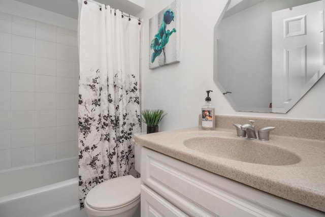 full bathroom featuring vanity, toilet, and shower / bath combo with shower curtain