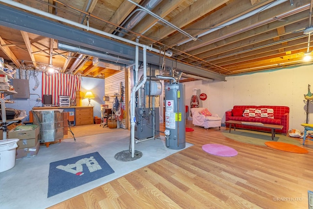 basement with heating unit and water heater