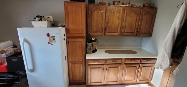 kitchen featuring white refrigerator