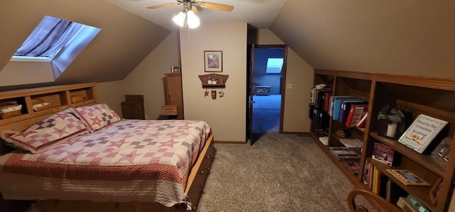 carpeted bedroom with ceiling fan and vaulted ceiling