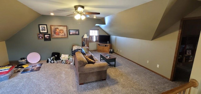 living room with carpet flooring, ceiling fan, and lofted ceiling