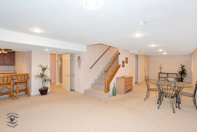 dining area with light carpet