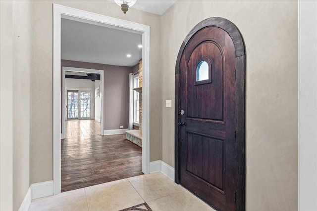 entrance foyer with light tile patterned floors