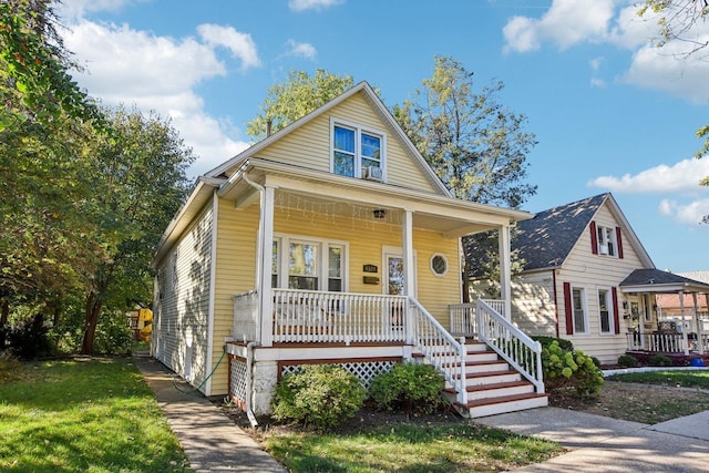 bungalow-style house featuring covered porch