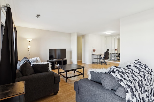 living room featuring light wood-type flooring