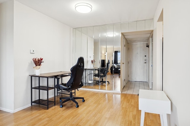 office space with light hardwood / wood-style flooring