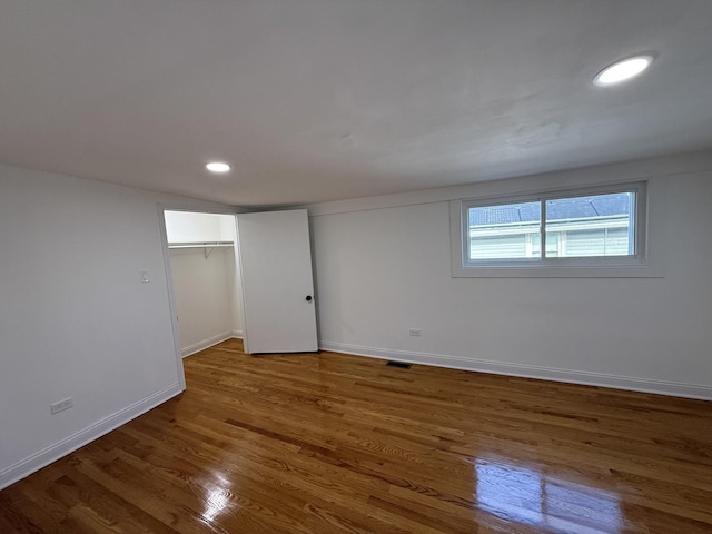 interior space with dark hardwood / wood-style floors