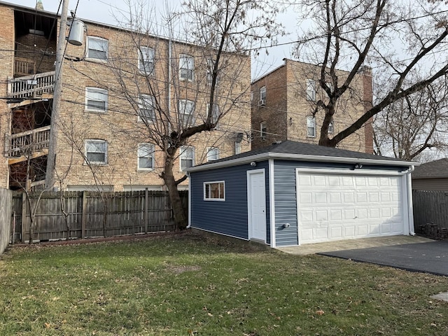 garage with a lawn