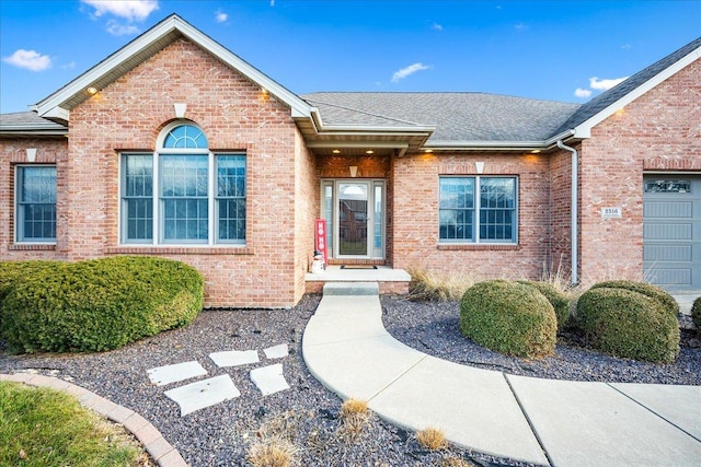 property entrance featuring a garage