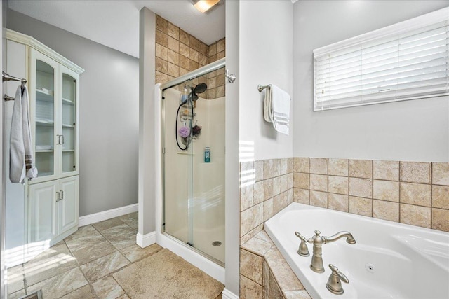 bathroom with independent shower and bath