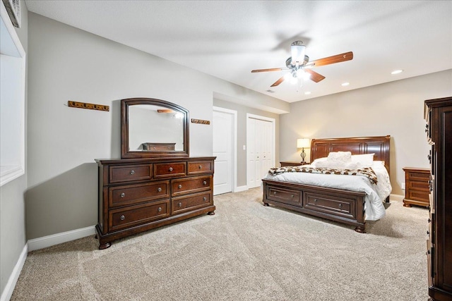 carpeted bedroom with ceiling fan