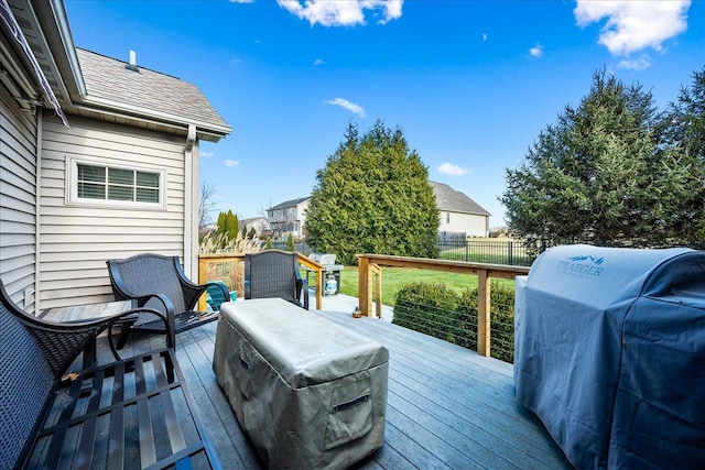 wooden terrace with area for grilling