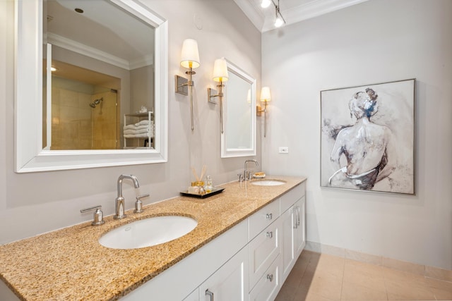 bathroom featuring double vanity, ornamental molding, a sink, and tile patterned floors