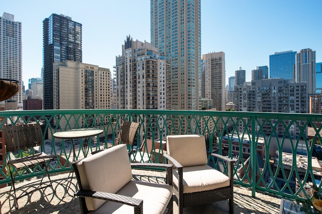 balcony featuring a city view