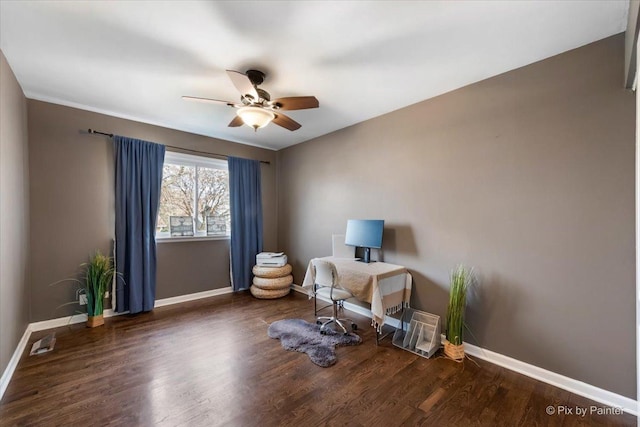 interior space featuring ceiling fan and dark hardwood / wood-style flooring