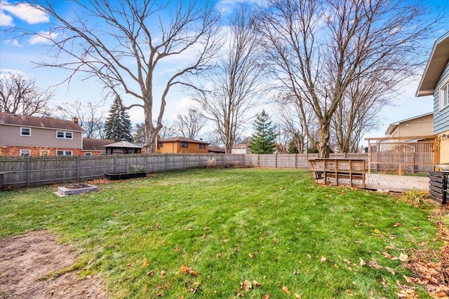 view of yard featuring a deck