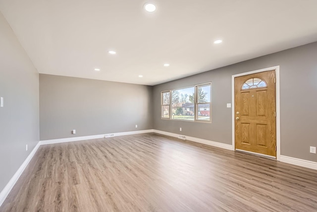 foyer entrance featuring light hardwood / wood-style floors