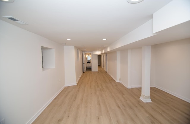 corridor featuring light wood-type flooring