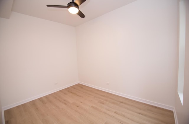 spare room with ceiling fan and light hardwood / wood-style floors