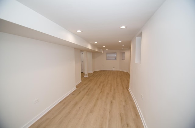 basement featuring light wood-type flooring