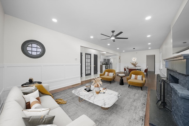 living room featuring ceiling fan