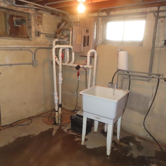 basement featuring electric panel