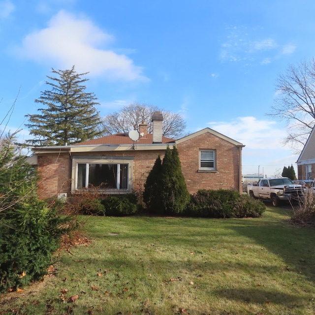 exterior space featuring a lawn