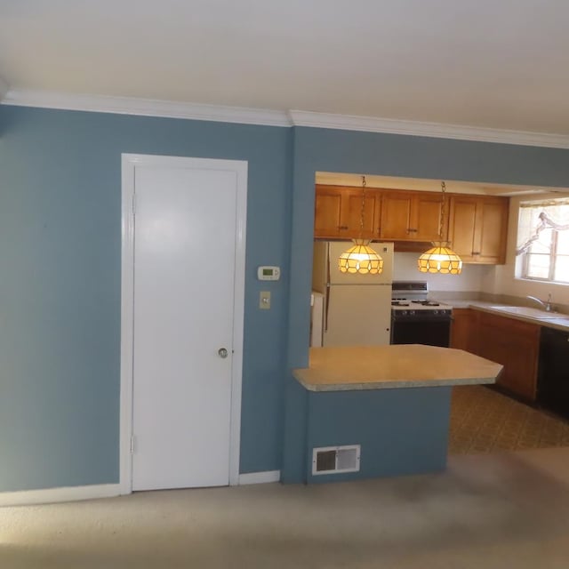 kitchen featuring crown molding, sink, light colored carpet, and white appliances