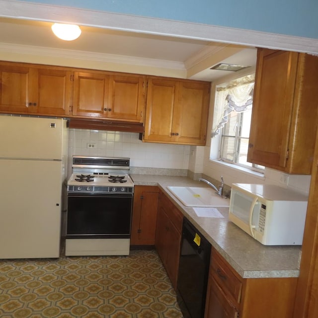 kitchen with white appliances, backsplash, crown molding, and sink