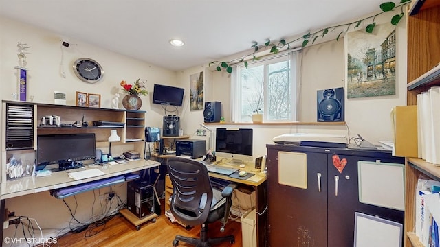 office with wood-type flooring