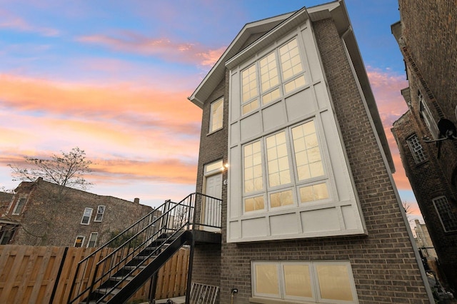 view of property exterior at dusk