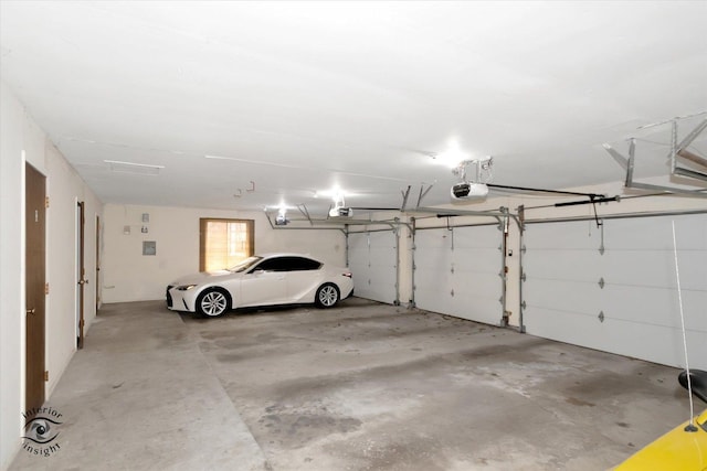 garage featuring a garage door opener